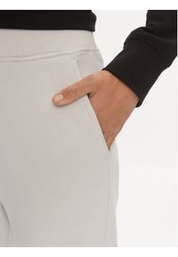 Calvin Klein Jeans Spodnie dresowe Diffused Monologo J20J223422 Szary Regular Fit. Kolor: szary. Materiał: bawełna