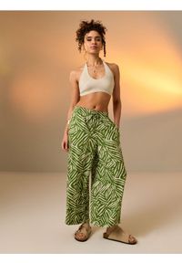 Sinsay - Wiskozowe spodnie wide leg - zielony. Kolor: zielony