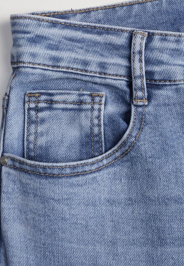 Renee - Niebieskie Jeansy Szerokie z Wytarciami High Waist Calale. Stan: podwyższony. Kolor: niebieski