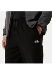 The North Face Spodnie dresowe Glacier NF0A8D0T Czarny Regular Fit. Kolor: czarny. Materiał: syntetyk #6