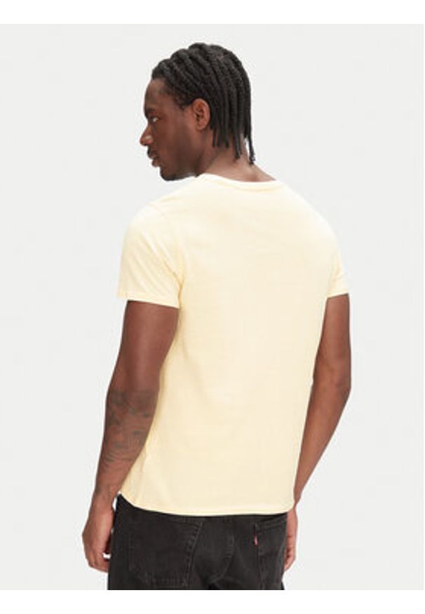 Tommy Jeans T-Shirt DM0DM04411 Żółty Slim Fit. Kolor: żółty. Materiał: bawełna