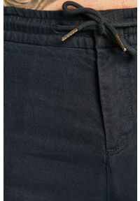 Guess Jeans - Spodnie. Kolor: niebieski. Materiał: bawełna, jeans, materiał, tkanina, len, poliester. Wzór: gładki #4