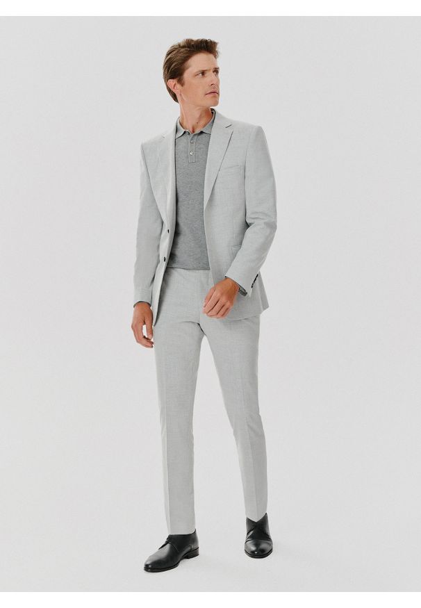 Pako Lorente - PAKO LORENTE – Spodnie garniturowe w kolorze jasnoszarym. Kolor: szary. Materiał: poliester, elastan, wiskoza. Styl: elegancki