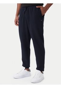 TOMMY HILFIGER - Tommy Hilfiger Spodnie dresowe Essential MW0MW37236 Granatowy Regular Fit. Kolor: niebieski. Materiał: bawełna #1