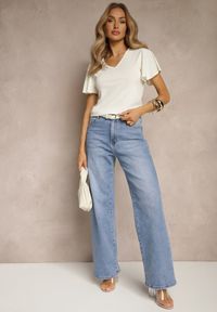 Renee - Beżowa Bluzka Ozdobiona Rozkloszowanymi Rękawami Sunetha. Okazja: na co dzień. Typ kołnierza: dekolt w kształcie V. Kolor: beżowy. Materiał: jeans. Wzór: aplikacja. Styl: casual, elegancki #2