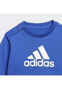 Adidas - Badge of Sport French Terry Jogger. Kolor: niebieski, wielokolorowy, biały. Materiał: dresówka. Styl: sportowy