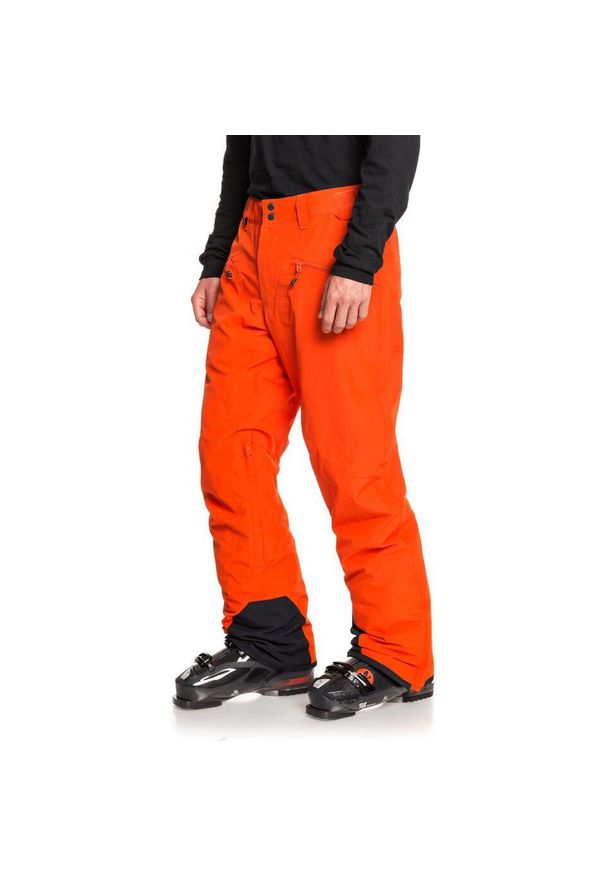 Spodnie snowboardowe męskie Quiksilver Boundry. Kolor: czerwony, wielokolorowy, pomarańczowy. Materiał: poliester. Sezon: zima. Sport: snowboard