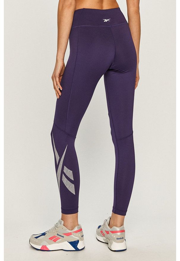 Reebok - Legginsy. Kolor: fioletowy. Materiał: dzianina. Wzór: gładki