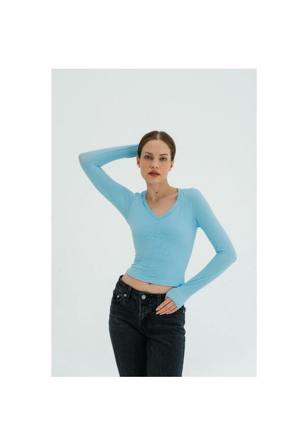 MOONHOLI - Longsleeve do jogi damski Moonholi NY Chic z długim rękawem. Kolor: niebieski. Długość rękawa: długi rękaw. Długość: długie. Sport: joga i pilates