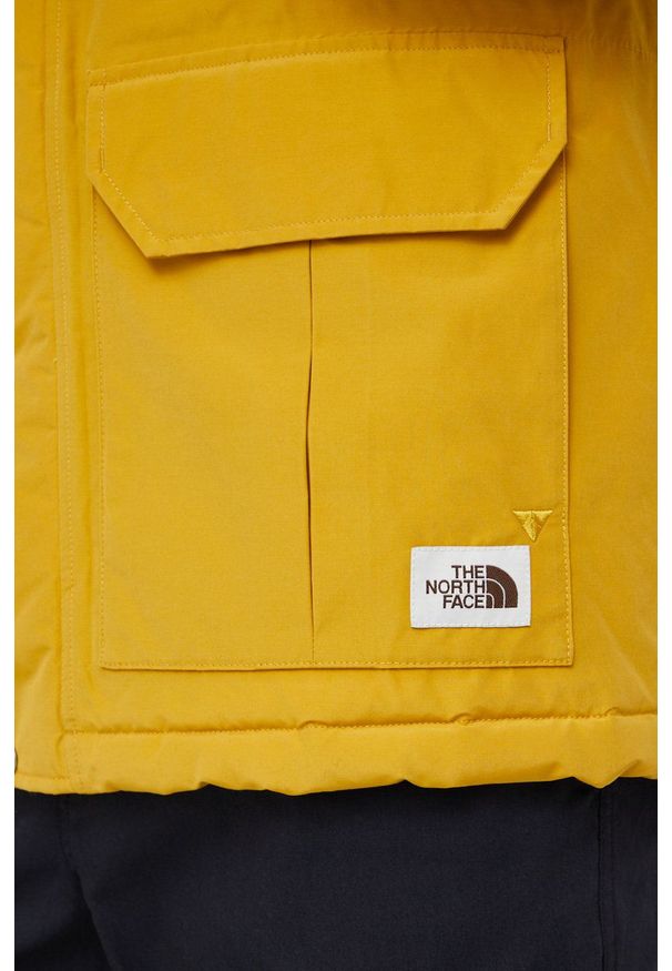 The North Face Kurtka męska kolor żółty zimowa. Okazja: na co dzień. Kolor: żółty. Materiał: włókno, materiał. Długość rękawa: raglanowy rękaw. Sezon: zima. Styl: casual