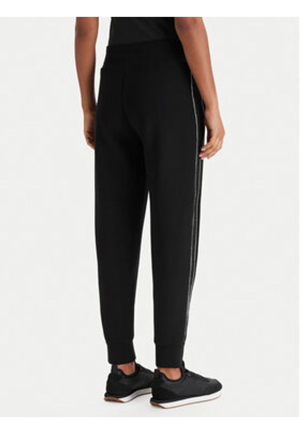 Guess Spodnie dresowe W6RB45 KBYE2 Czarny Regular Fit. Kolor: czarny. Materiał: syntetyk