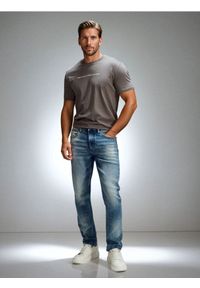 Sinsay - Jeansy slim fit z efektem sprania - niebieski. Kolor: niebieski #1