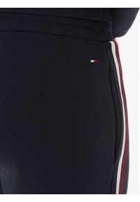 TOMMY HILFIGER - Tommy Hilfiger Spodnie dresowe Bold Global Stripe MW0MW32677 Granatowy Regular Fit. Kolor: niebieski. Materiał: bawełna, dresówka, syntetyk #4