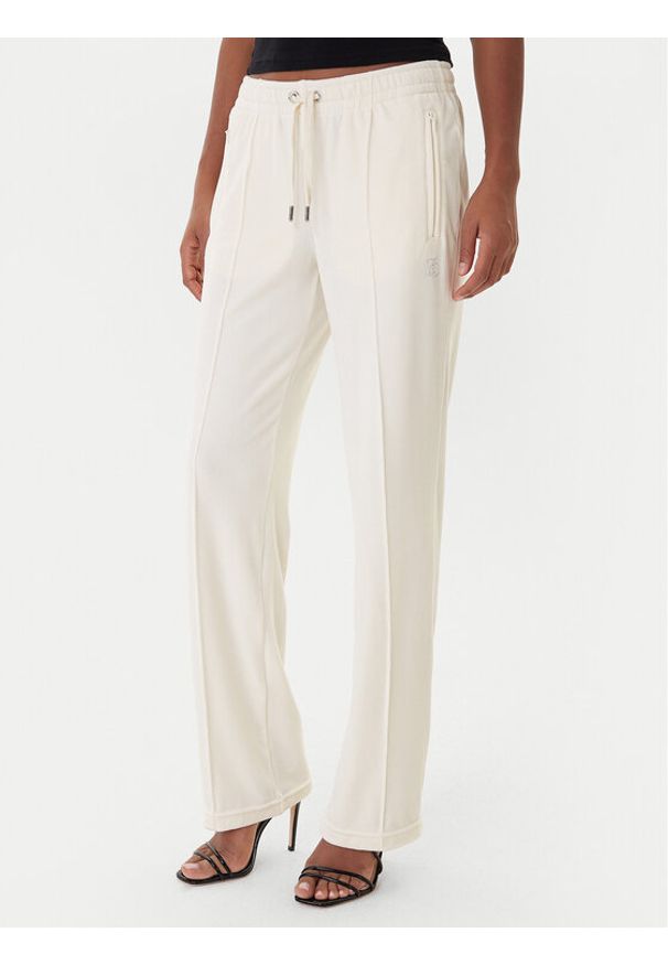 Juicy Couture Spodnie dresowe Tina JCWBJ225307 Beżowy Regular Fit. Kolor: beżowy. Materiał: syntetyk