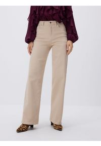 Reserved - Jeansy wide leg - kremowy. Kolor: kremowy