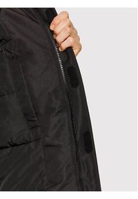 Tommy Jeans Kurtka zimowa Tjm Tech DM0DM11189 Czarny Regular Fit. Kolor: czarny. Materiał: syntetyk. Sezon: zima