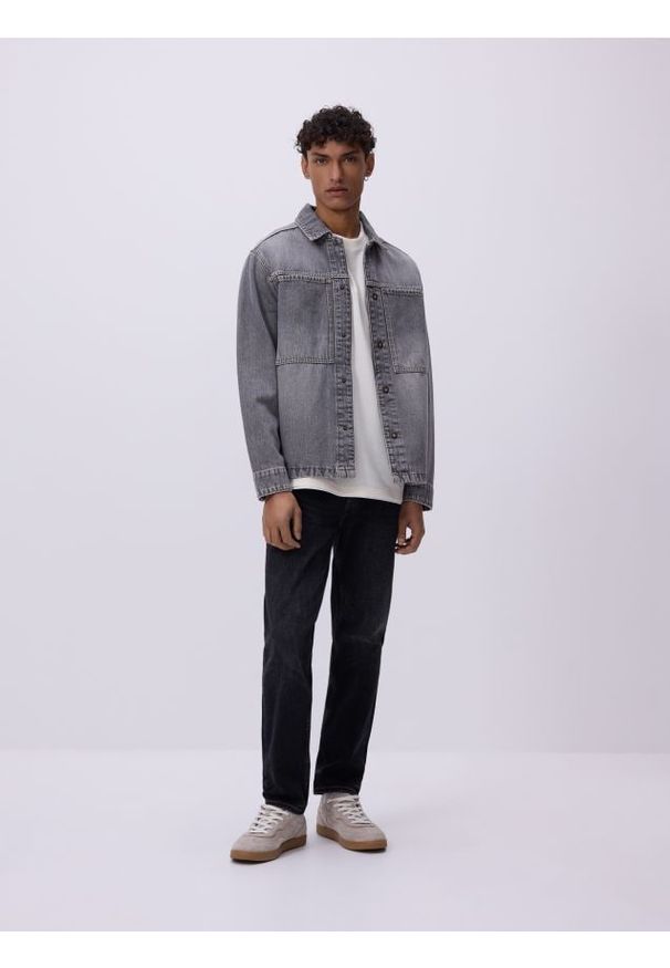 Reserved - Jeansy slim z efektem sprania - czarny. Kolor: czarny