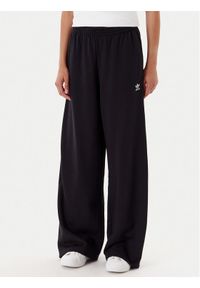 Adidas - adidas Spodnie dresowe Essentials JW2812 Czarny Wide Leg. Kolor: czarny. Materiał: bawełna