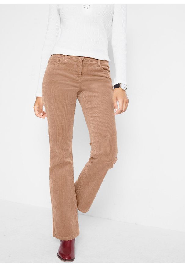 bonprix - Spodnie sztruksowe ze stretchem o kroju bootcut. Kolor: brązowy. Materiał: sztruks