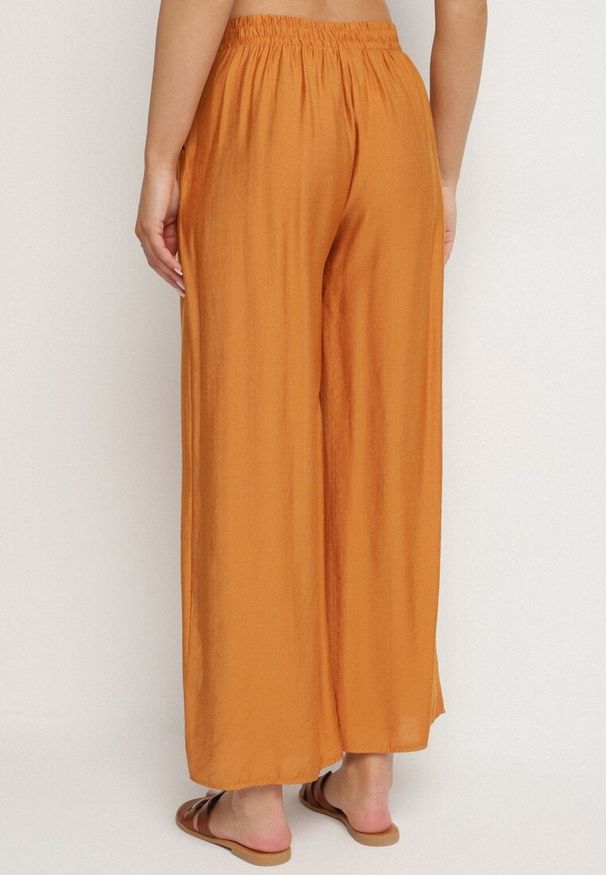 Born2be - Pomarańczowe Wiskozowe Szerokie Spodnie z Wysokim Stanem Divola. Okazja: na spacer, na co dzień. Stan: podwyższony. Kolor: pomarańczowy. Materiał: wiskoza. Sezon: lato. Styl: casual, klasyczny