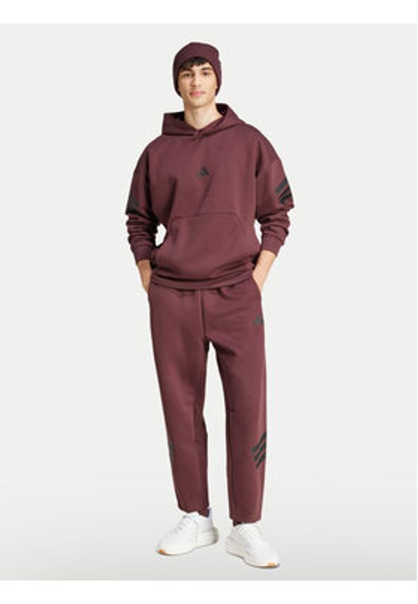 Adidas - adidas Spodnie dresowe Future Icons 3-Stripes JD4888 Bordowy Loose Fit. Kolor: czerwony. Materiał: syntetyk, bawełna