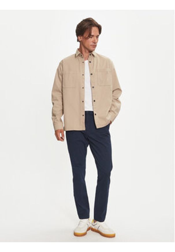 Tommy Jeans Chinosy Austin DM0DM20445 Granatowy Slim Fit. Kolor: niebieski. Materiał: bawełna