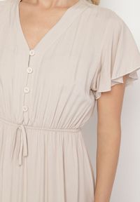 Born2be - Beżowa Bawełniana Sukienka o Rozkloszowanym Kroju z Wiązaniem w Talii Folarina. Okazja: na spacer, na co dzień. Typ kołnierza: dekolt w serek. Kolor: beżowy. Materiał: bawełna. Długość rękawa: krótki rękaw. Typ sukienki: rozkloszowane. Styl: casual, elegancki #4