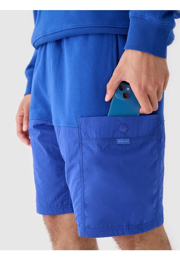 4f - 4F Spodenki casual męskie - niebieskie XXL. Okazja: na co dzień. Kolor: niebieski. Materiał: bawełna, materiał. Długość: krótkie. Styl: casual