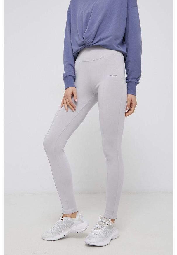 Guess Legginsy damskie kolor szary gładkie. Kolor: szary. Materiał: dzianina. Wzór: gładki