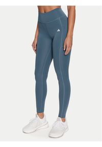 Adidas - adidas Legginsy Optime IT9110 Niebieski Slim Fit. Kolor: niebieski. Materiał: syntetyk