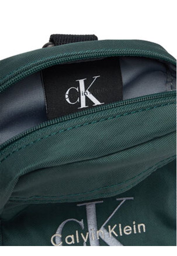 Calvin Klein Saszetka Bold Logo Nylon Slim Reporter LV04D3231G Zielony. Kolor: zielony. Materiał: materiał