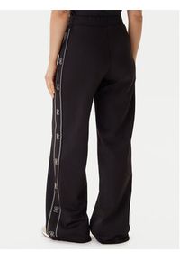 Guess Spodnie dresowe V5BB12 KCX22 Czarny Wide Leg. Kolor: czarny. Materiał: syntetyk #2