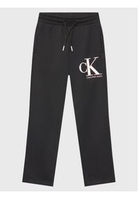 Calvin Klein Jeans Spodnie dresowe Monogram IG0IG01985 Czarny Regular Fit. Kolor: czarny. Materiał: bawełna #1