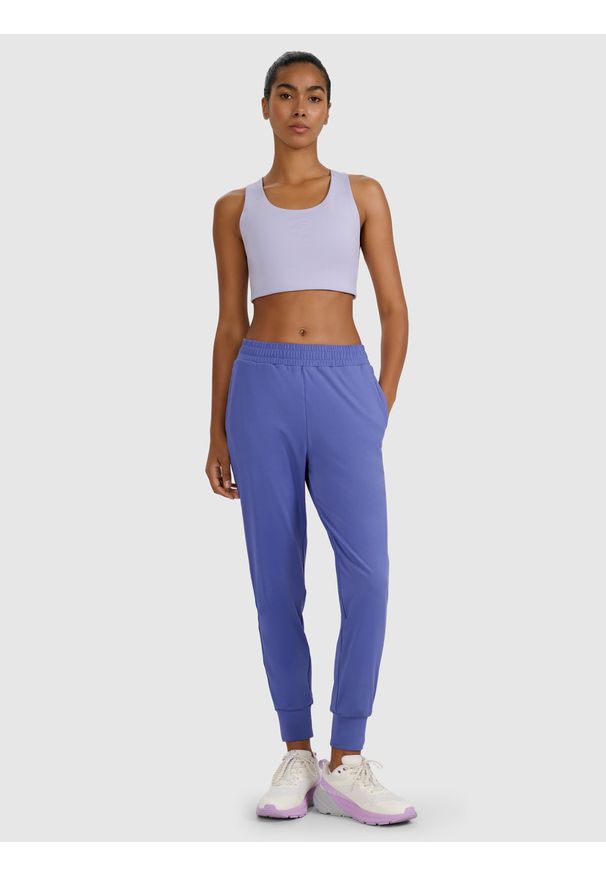 4f - 4F Spodnie treningowe szybkoschnące damskie - granatowe XS. Kolor: niebieski. Materiał: dzianina, elastan, włókno, syntetyk, materiał. Wzór: ze splotem. Sport: fitness