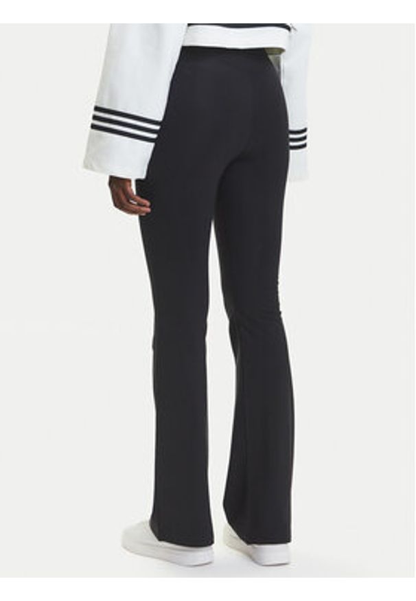 Adidas - adidas Legginsy Essentials Small Logo JD9961 Czarny Flared Fit. Kolor: czarny. Materiał: bawełna
