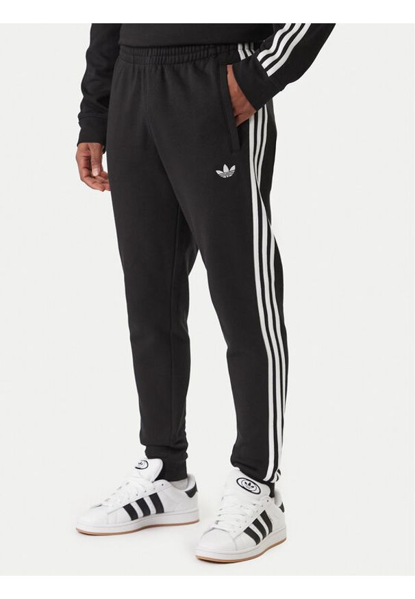 Adidas - adidas Spodnie dresowe 3-Stripes KE3562 Czarny Slim Fit. Kolor: czarny. Materiał: syntetyk, bawełna
