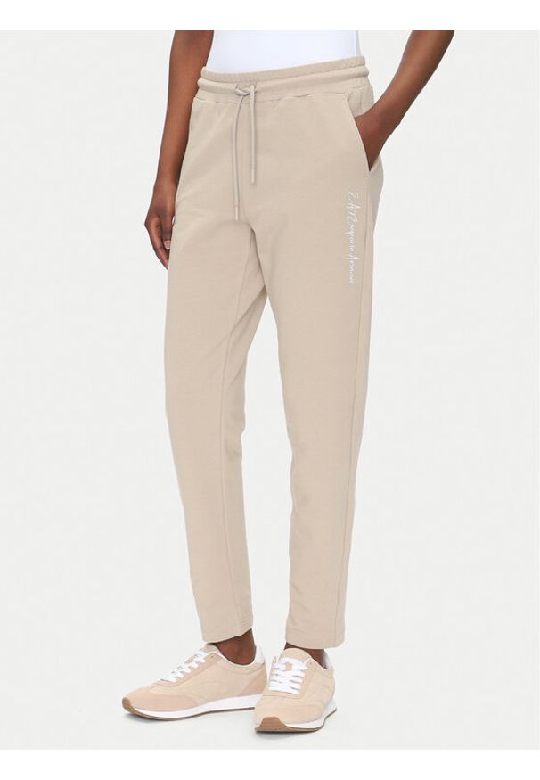 EA7 Emporio Armani Spodnie dresowe 7W000489 AF12951 U6155 Beżowy Regular Fit. Kolor: beżowy. Materiał: bawełna