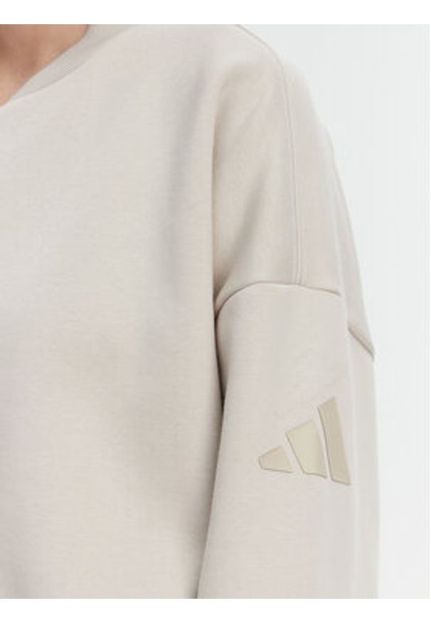 Adidas - adidas Bluza Essentials Contemporary Logo JD9972 Beżowy Loose Fit. Kolor: beżowy. Materiał: bawełna