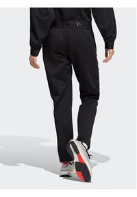 Adidas - adidas Spodnie dresowe Tiro Suit-Up Advanced Tracksuit Bottoms IB2306 Czarny Regular Fit. Kolor: czarny. Materiał: syntetyk #3