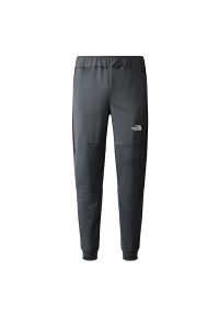 Spodnie The North Face Mountain Athletics Fleece 0A823UMN81 - szare. Kolor: szary. Materiał: poliester, dzianina. Sport: fitness