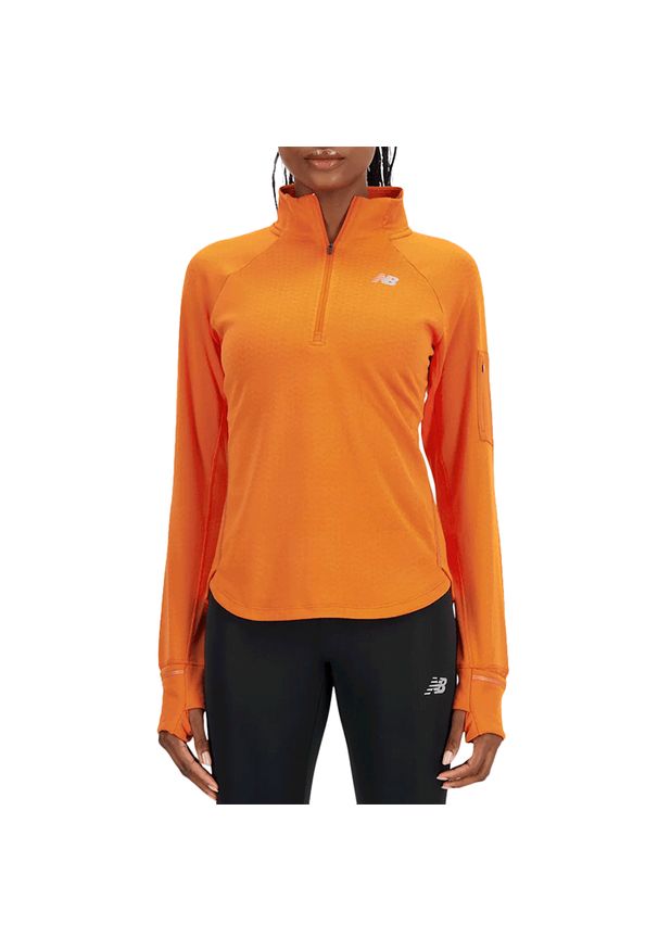 Bluza New Balance WT23252CEN - pomarańczowa. Kolor: pomarańczowy. Materiał: skóra, tkanina, poliester. Styl: sportowy. Sport: fitness
