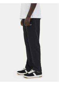 Jack & Jones - Jack&Jones Spodnie dresowe Kane Norrebro 12282553 Czarny Relaxed Fit. Kolor: czarny. Materiał: bawełna