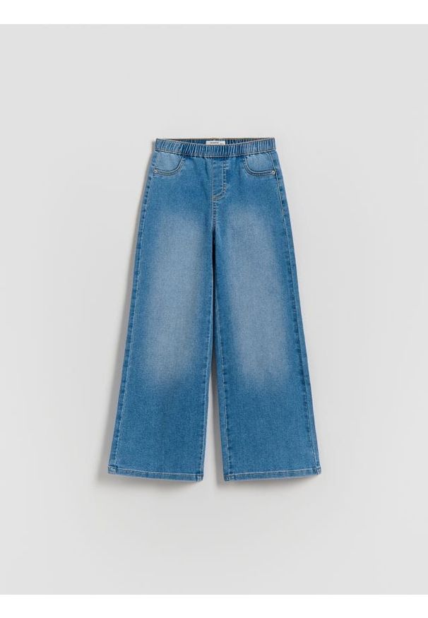 Reserved - Jeansy wide leg z efektem sprania - niebieski. Kolor: niebieski