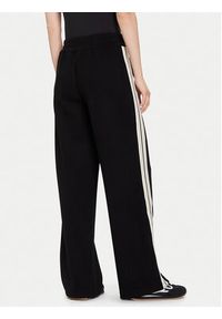 Guess Spodnie palazzo V5BB16 KCX52 Czarny Wide Leg. Kolor: czarny. Materiał: syntetyk