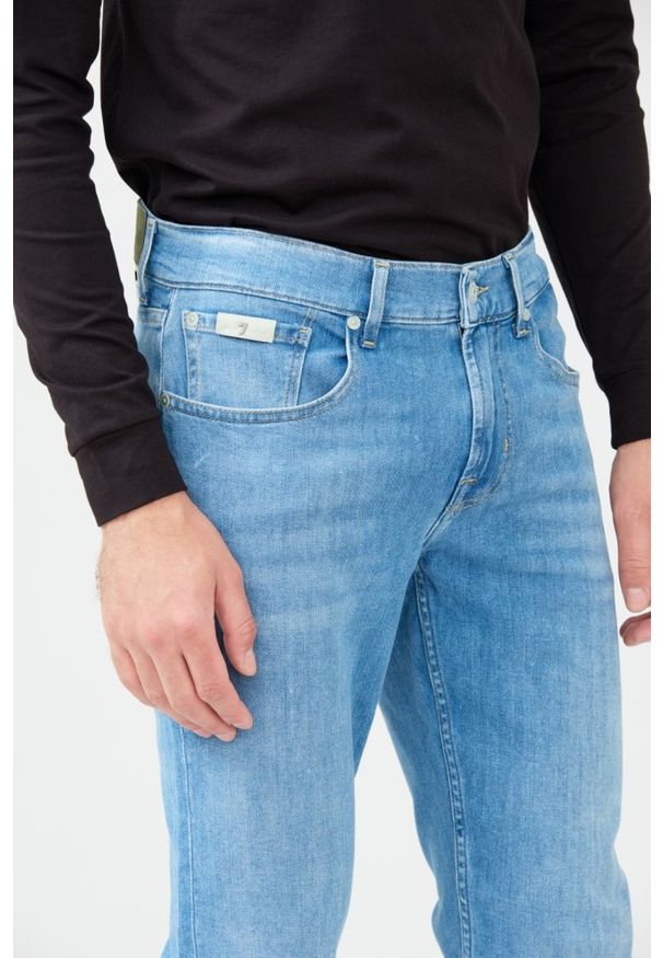 7 FOR ALL MANKIND Jeansy niebieskie Slimmy Tapered. Kolor: niebieski
