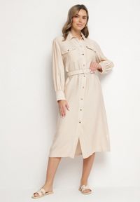 Born2be - Beżowa Wiskozowa Sukienka o Koszulowym Kroju z Paskiem z Klamrą i Kieszeniami Lisavianna. Okazja: na co dzień, do pracy, na spotkanie biznesowe. Kolor: beżowy. Materiał: wiskoza. Długość rękawa: długi rękaw. Typ sukienki: koszulowe. Styl: biznesowy, klasyczny, casual, elegancki #1
