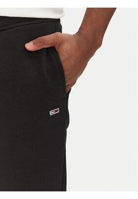 Tommy Jeans Spodnie dresowe Flag DM0DM20473 Czarny Slim Fit. Kolor: czarny. Materiał: bawełna