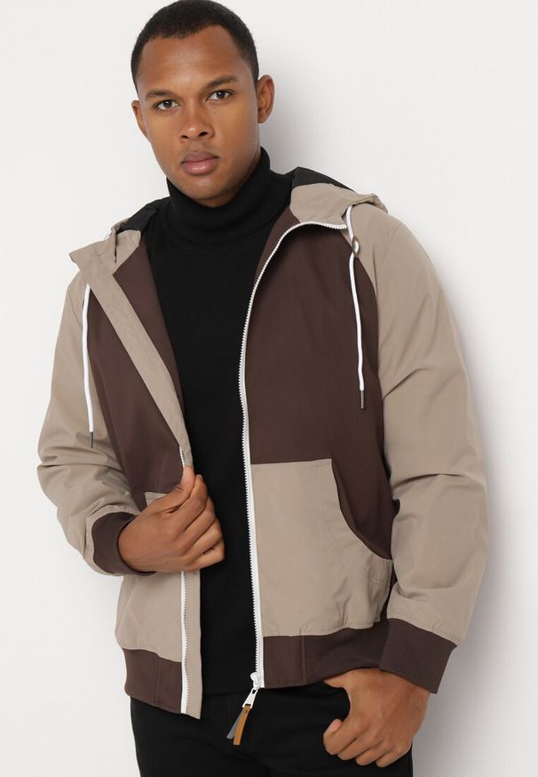 Born2be - Brązowa Kurtka Wiatrówka z Kapturem i Ociepleniem Nevelaera. Okazja: na co dzień. Typ kołnierza: kaptur. Kolor: brązowy. Materiał: jeans, materiał. Sezon: wiosna, jesień. Styl: casual, klasyczny, sportowy