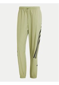 Adidas - adidas Spodnie dresowe Future Icons 3-Stripes IW8549 Zielony Regular Fit. Kolor: zielony. Materiał: syntetyk