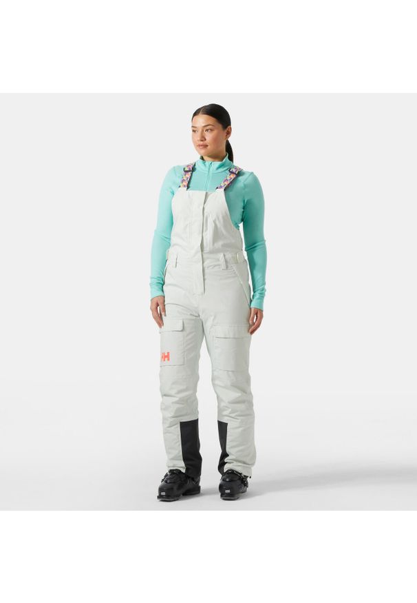 Damskie spodnie narciarskie cargo na szelkach Helly Hansen Switch. Kolor: zielony. Sezon: zima. Sport: narciarstwo